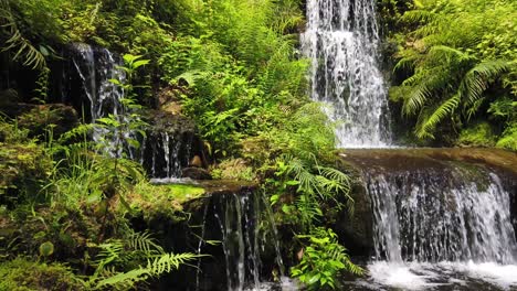 beautiful flowing waterfall feature at namtok wang ta krai nature park in nakhon nayok, thailand