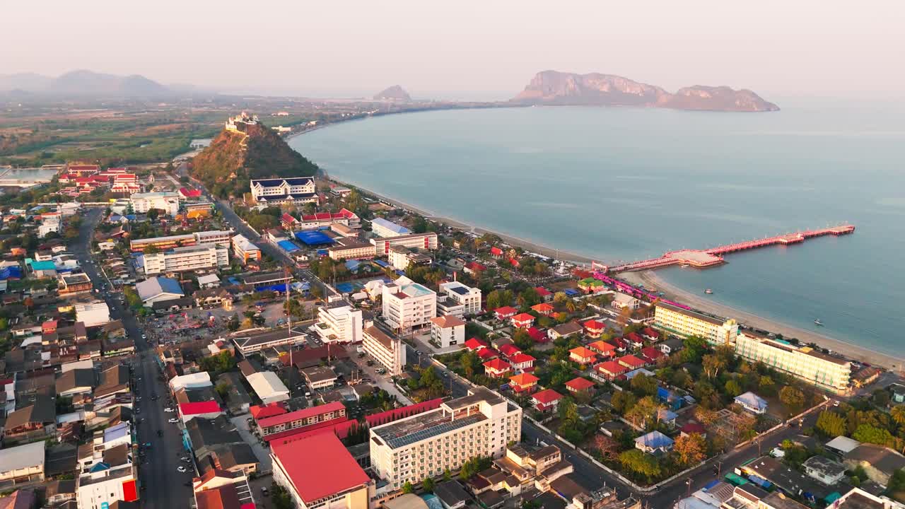 Prachuap Khiri Khan village marine coastline town Thailand aerial at sunset
