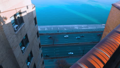 looking down to a busy road from a roof top near downtown chicago