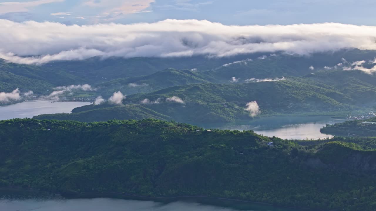Cinematic aerial over the volcanic landscape of Dinagat island Philippines.