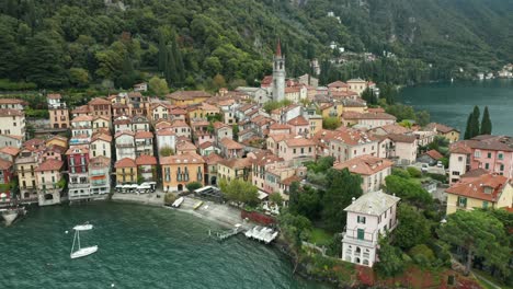 aerial: densly populated town of varenna near lake como