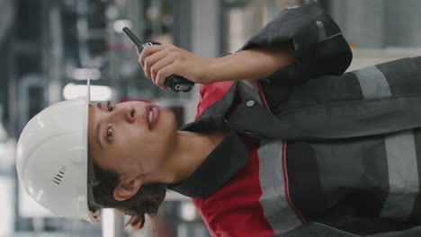 female factory worker with radio