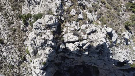 Mountain-range-rocky-aerial-top-down-view,-arid-landscape-establish-view