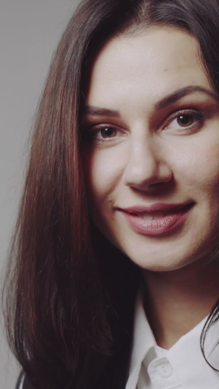 Woman posing in studio. Young fashion model girl posing in trendy wearing in studio