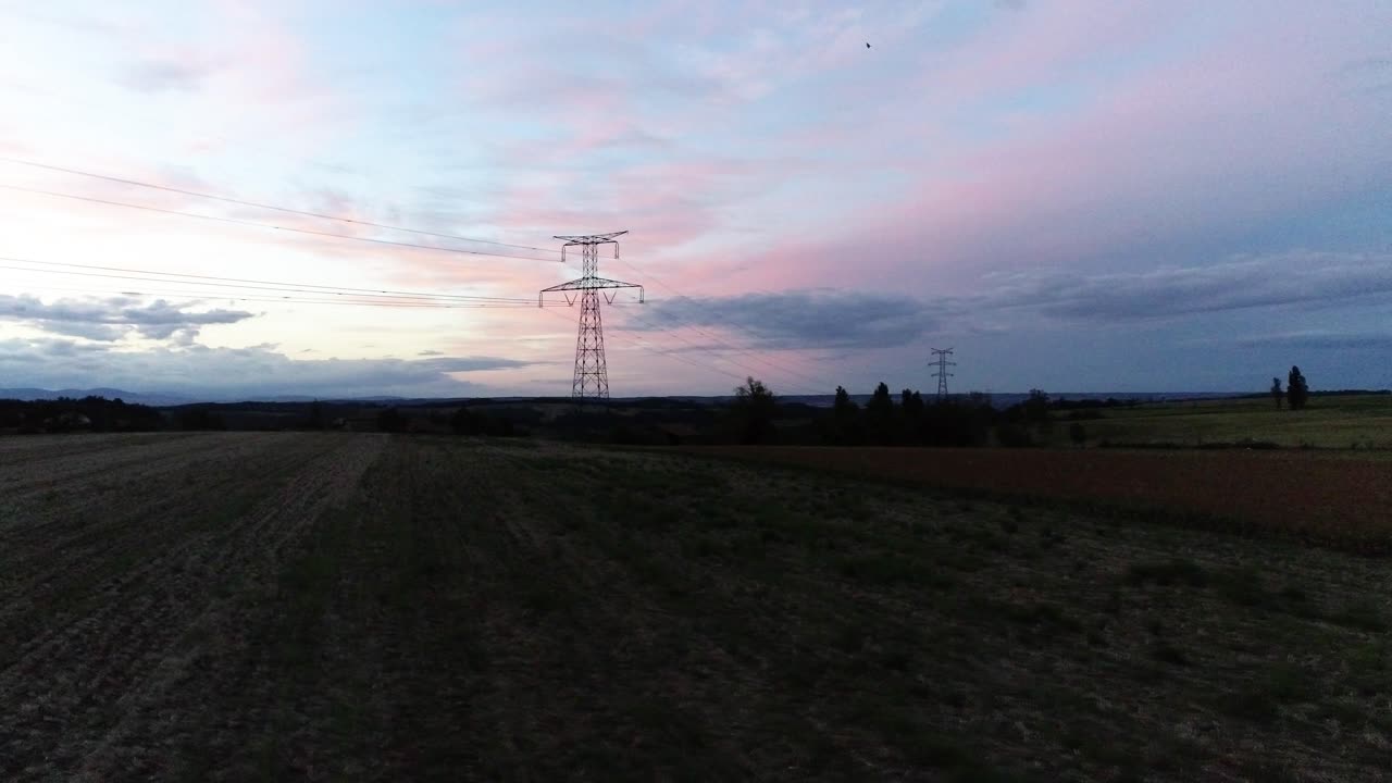 Drone footage of a sunset sunrise background on farmland