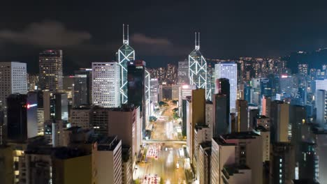 experience the energy of hong kong at night as the skyline shines brightly. observe the busy streets teeming with life under a starry sky. enjoy stunning architectural views from above.