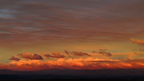 vibrant sunset sky with fiery orange clouds