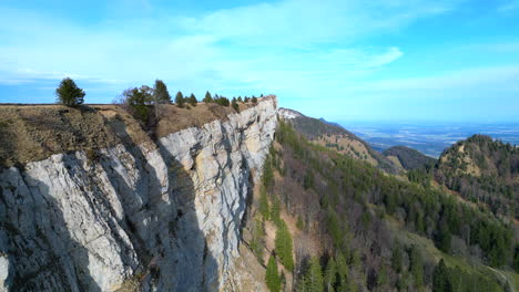 Aerial-along-rock-cliffs-of-Wandfluh-Solothurn,-Switzerland