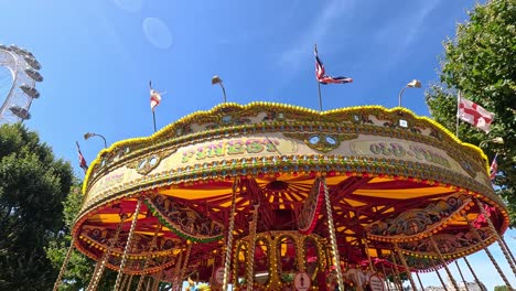 vibrant carousel spinning under a clear blue sky