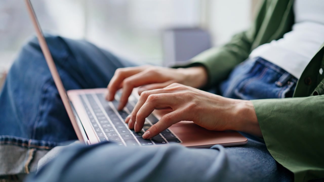 Copywriter hands typing laptop writing text home closeup. Unrecognizable woman