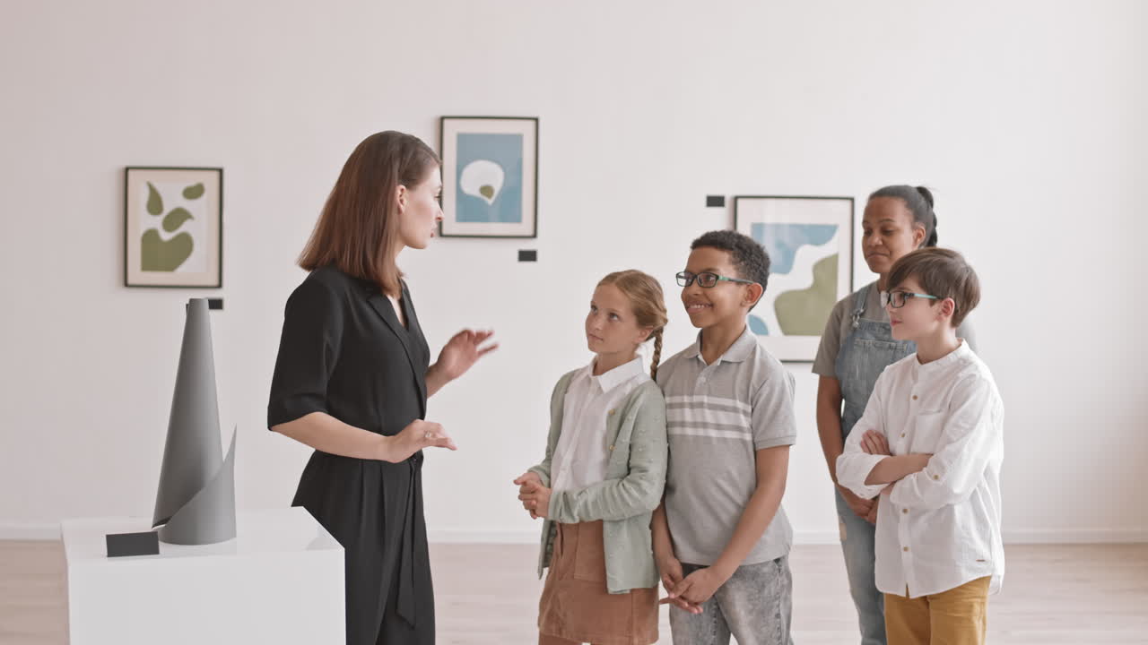 Tweens Learning About Art in Gallery