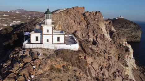 akrotori lighthouse santorini greece sunset drone footage