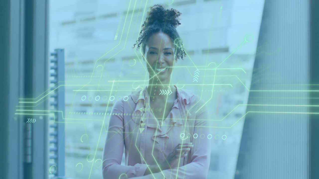 Circuit board animation over businesswoman standing with arms crossed in office