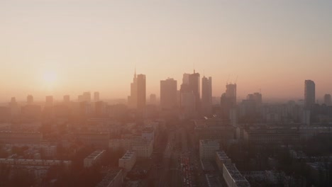 morning flight over warsaw. sunrise and fog