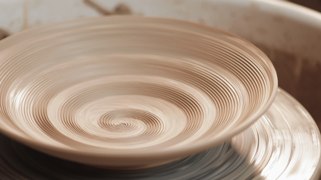 Making a bowl on a pottery wheel