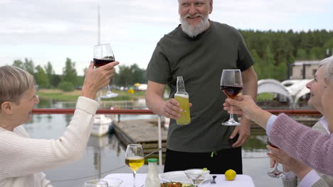 a group of senior people toasting