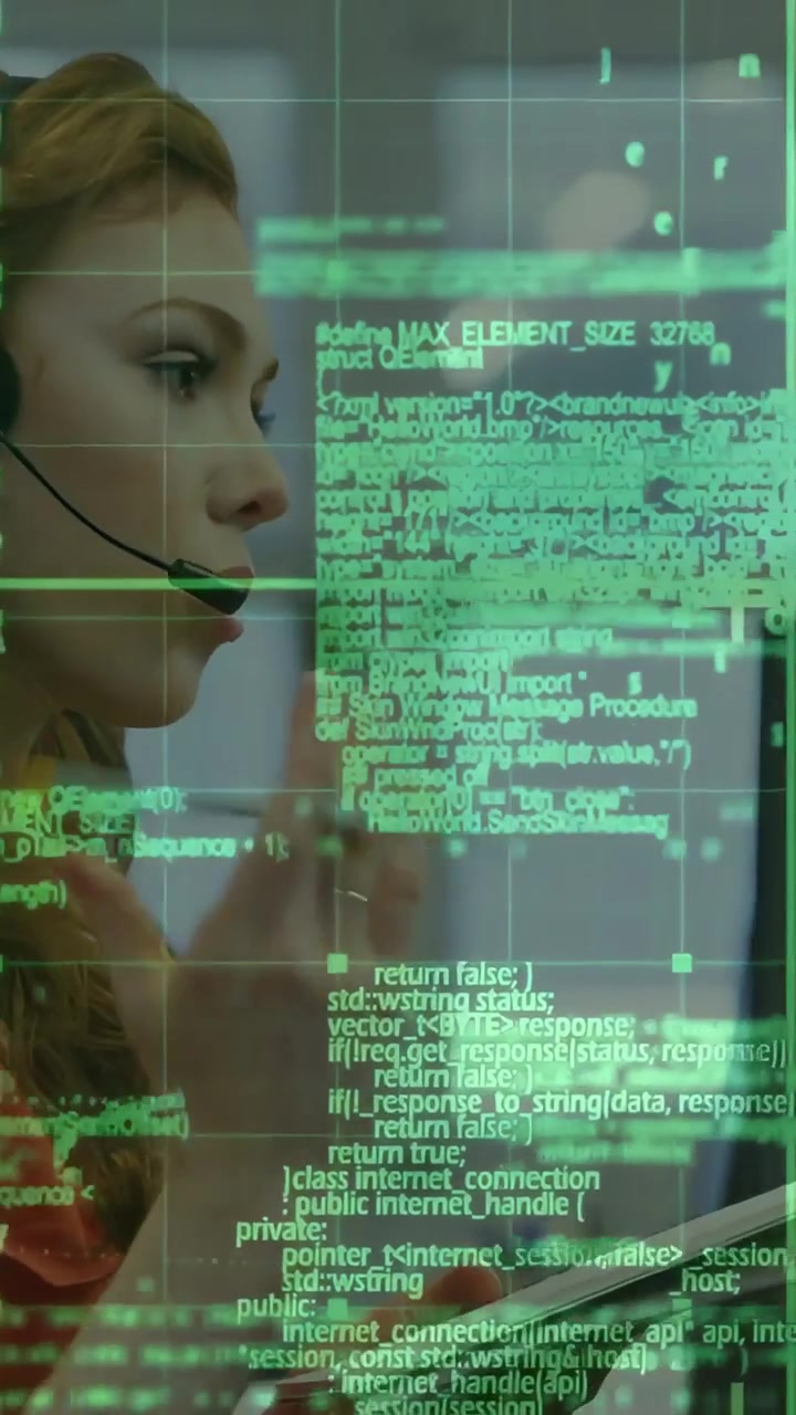 Vertical video: Support rep on headset taking call, typing and using phone while green code overlay