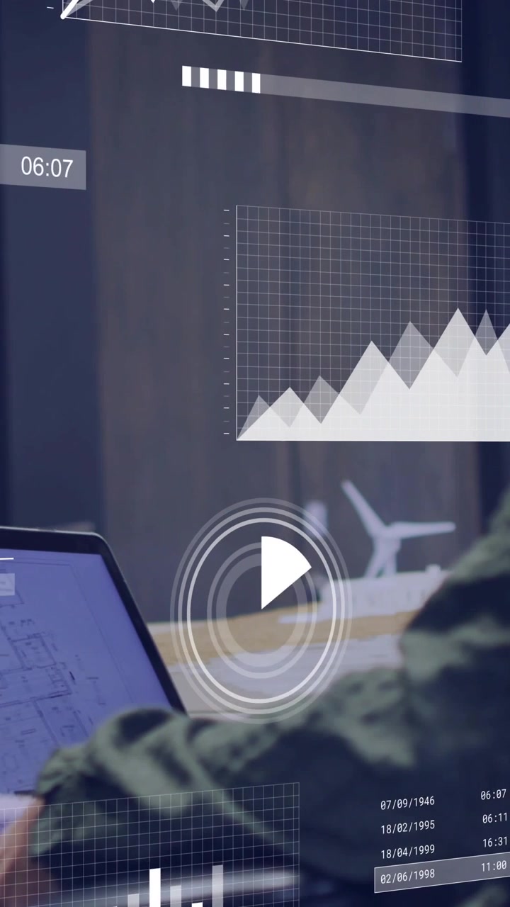 Vertical video: Woman typing laptop in office, animating charts and progress on screen for business