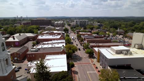 Aerial-push-by-church-along-franklin-street-in-chapel-hill-nc,-north-carolina