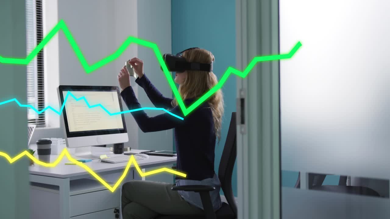 Woman putting on VR headset in office pointing and pinching animated graphs analyzing business data