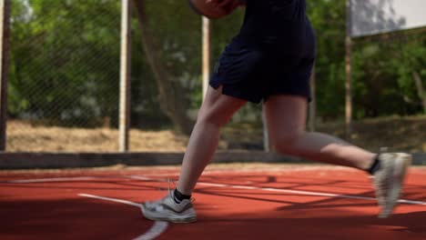 women playing outdoor basketball