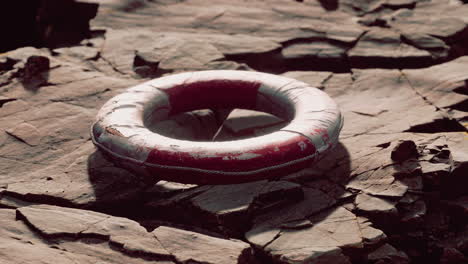 very old abandoned grungy lifebuoy