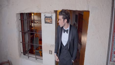 man in tuxedo at a cave hotel in cappadocia