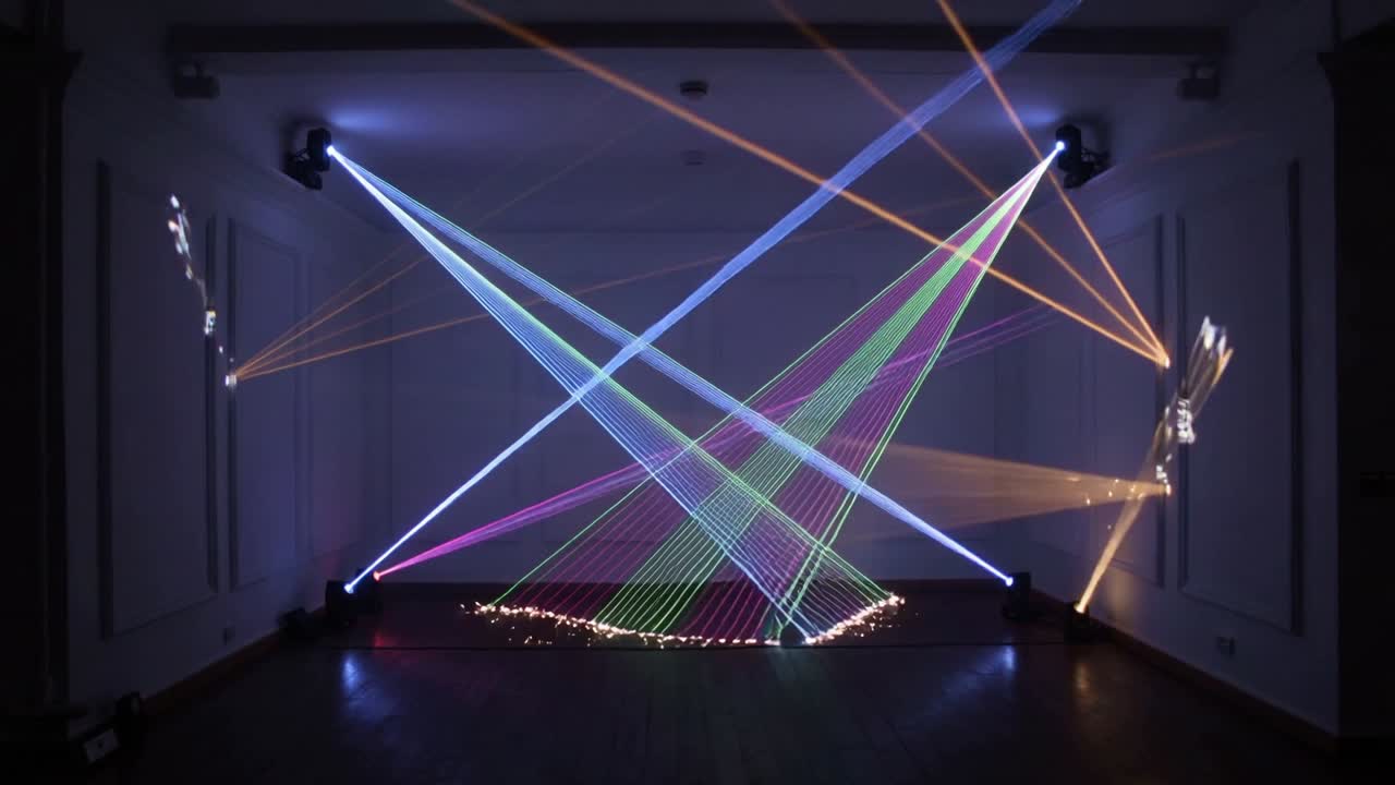 Cue activating moving heads sweeping beams in studio, front LEDs pulsing in haze for demo