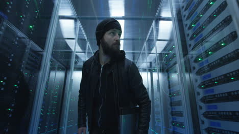 man walking in a server room