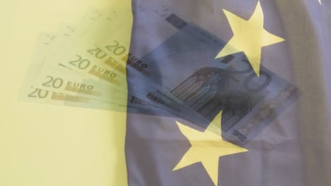 Animation-of-euro-bills-falling-over-eu-flag-on-grey-surface