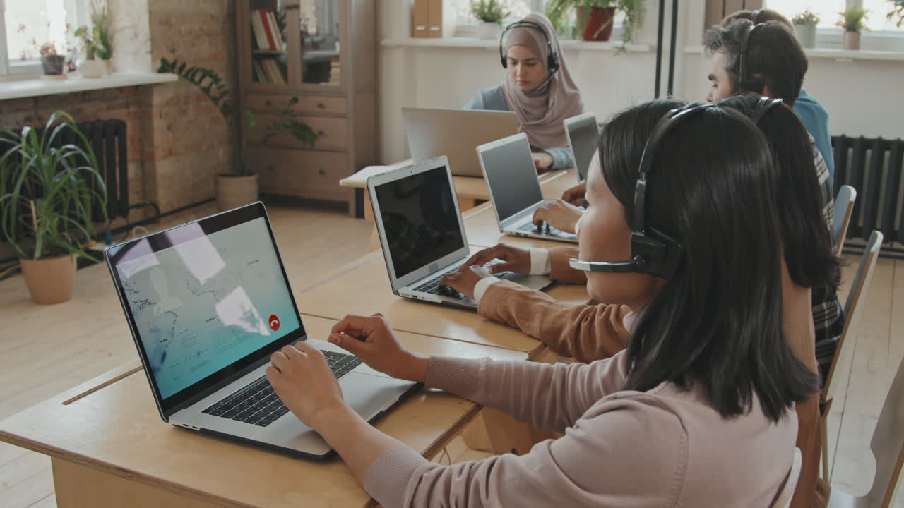 Call Center Agents Working in Office