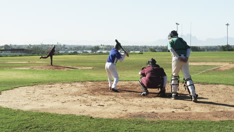 multiracial male players and umpire playing baseball on a pitch, slow motion