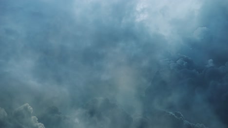 cinematic thick clouds in dark sky and thunderstorm