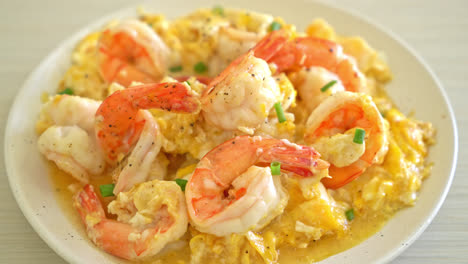 homemade creamy omelet with shrimps or scrambled eggs and shrimps