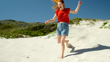 woman playing in the beach on a sunny day 4k