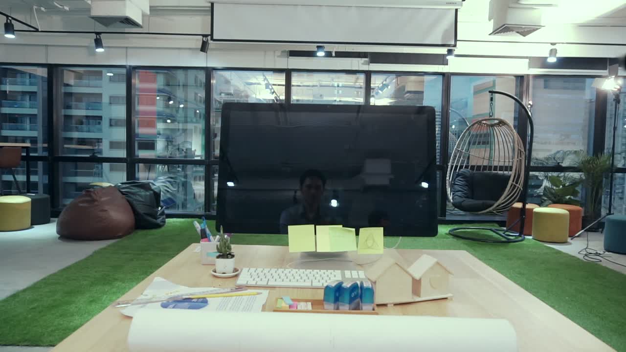 Creative business people group having conversation at office desk in workplace.