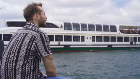 the man looking at the sea.