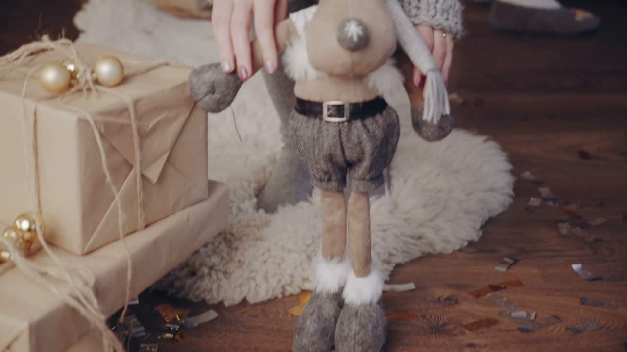 Christmas atmosphere in room. Young girl in the interior with Christmas decoration