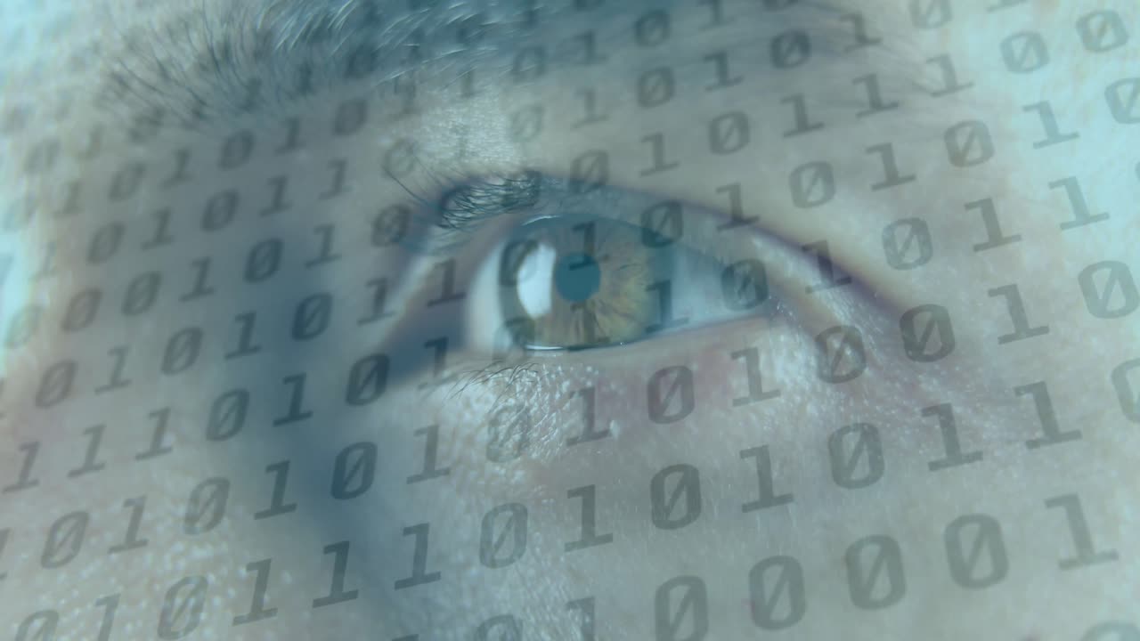 Animation of person's eye opening and closing with changing black binary numbers