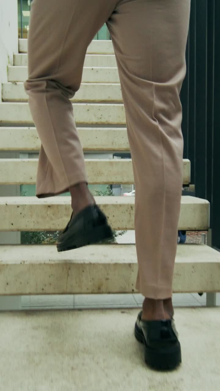 Person Walking Up Stairs