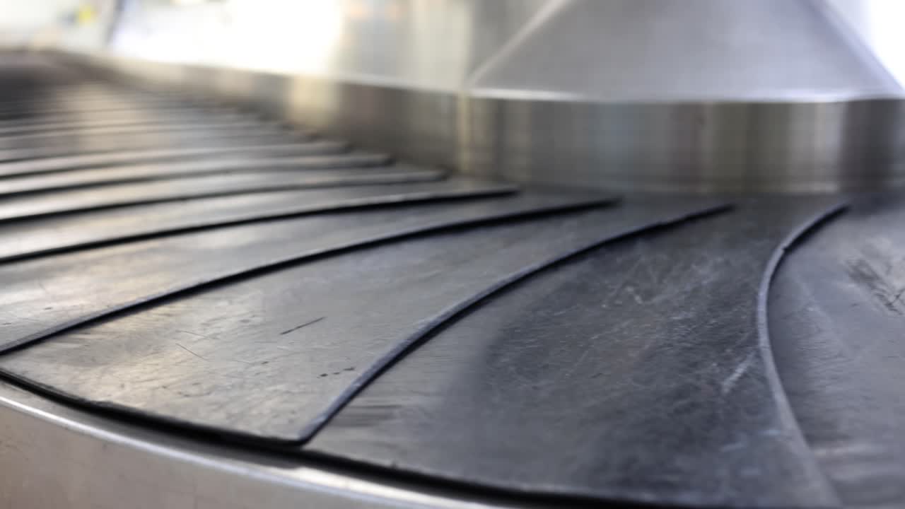 Empty Baggage Claim Carousel at Airport