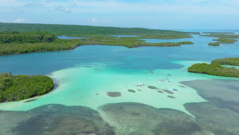 Boats-On-Caribbean-Sea-Surrounded-By-Lush-Islands-In-Morrocoy-National-Park,-Venezuela