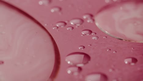 red chemical surface with flat bubbles floating
