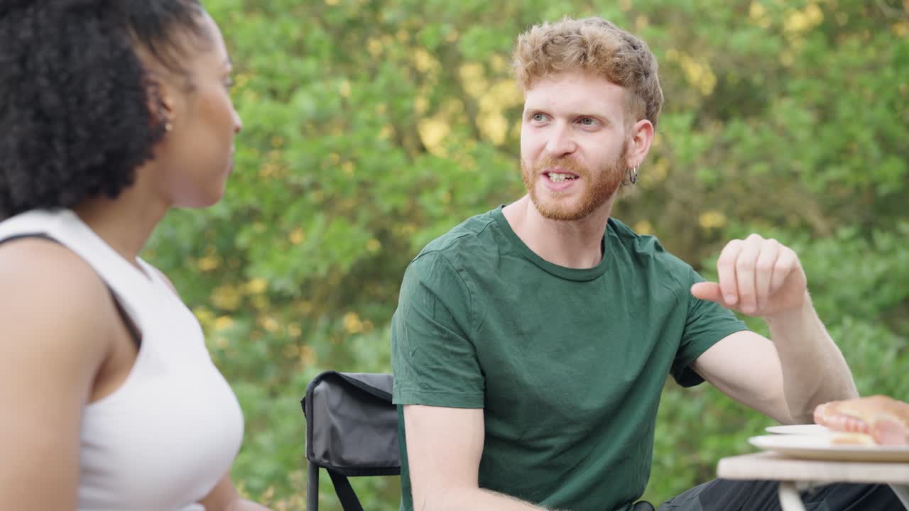 Couple having a picnic outdoors