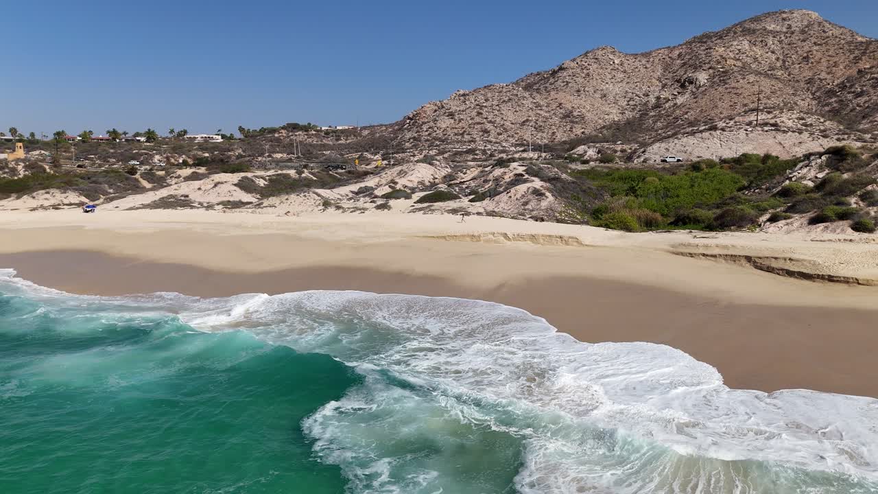 Aerial View of Cabo San Lucas Beach and Woman Walking on Sandy Shore by Ocean Waves, Mexico