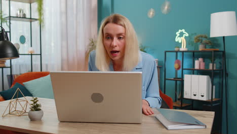 nervous stressed businesswoman manager quarreling laptop call talk online conflict at home office