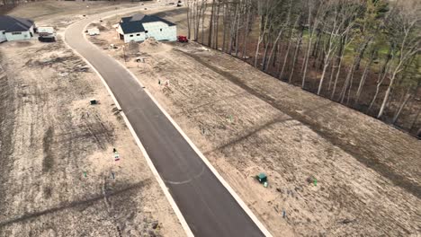 aerial track along a newly paved street