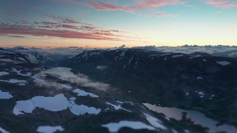 vast mountainous strynefjellet plateau under beautiful sunset skies
