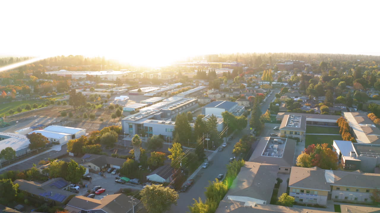 Aerial View of a Town or Suburban Area at Sunrise or Sunset