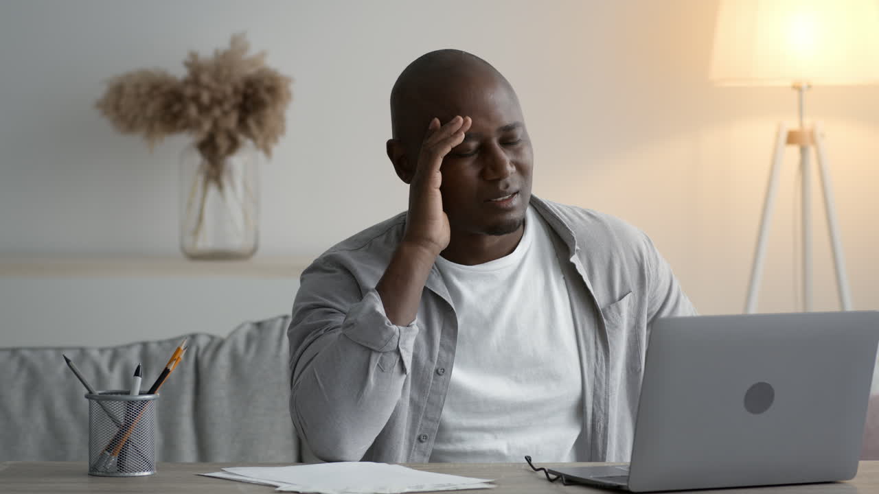 Stressed Man Working From Home